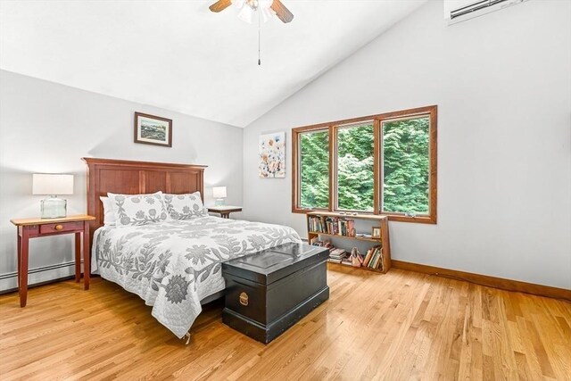 75 Winter St, Hopkinton, MA 01748 - bedroom featuring light wood-style flooring, a baseboard radiator, ceiling fan, and high vaulted ceiling