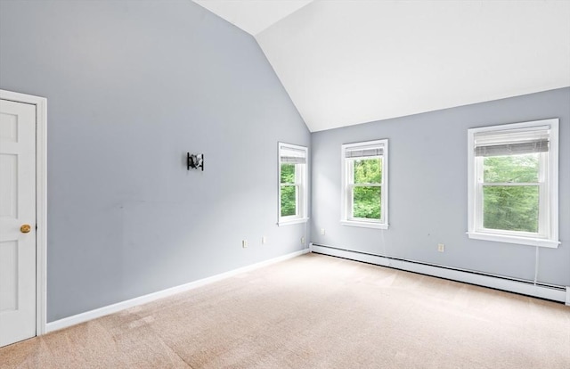 7 Evergreen Cir, Sterling, MA 01564 - carpeted empty room with baseboard heating and high vaulted ceiling