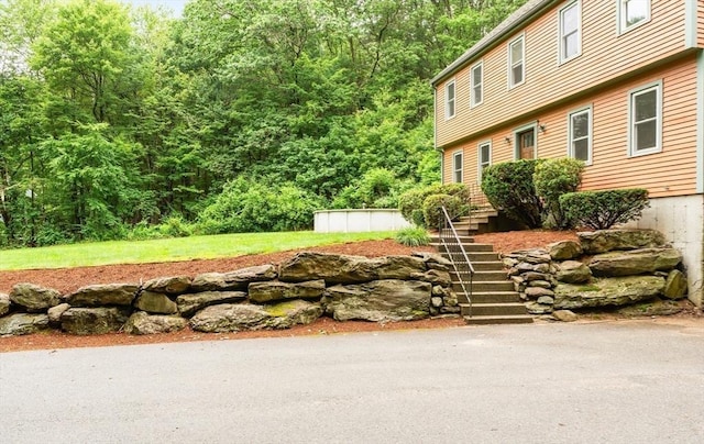 7 Evergreen Cir, Sterling, MA 01564 - view of yard with stairway and a view of trees