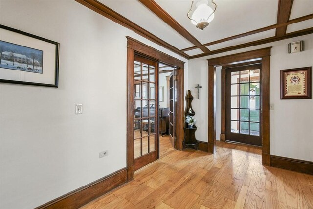 127 Carson Ave, Dalton, MA 01226 - foyer with baseboards, light wood finished floors, french doors, and coffered ceiling