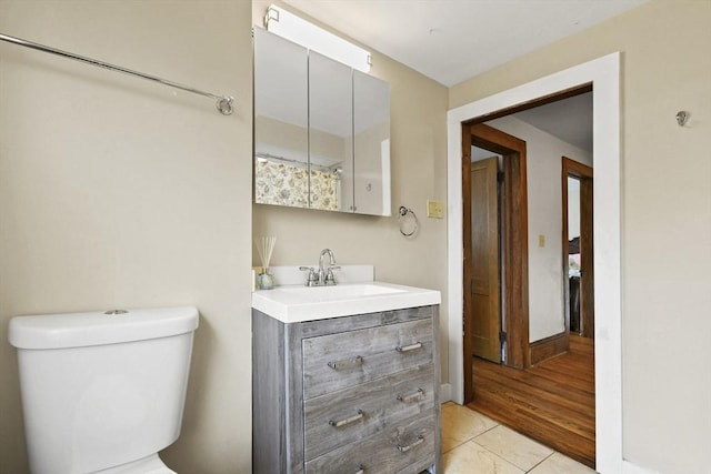 127 Carson Ave, Dalton, MA 01226 - bathroom featuring vanity, toilet, and baseboards