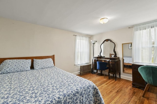 127 Carson Ave, Dalton, MA 01226 - bedroom with radiator, wood finished floors, and baseboards