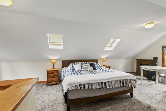 127 Carson Ave, Dalton, MA 01226 - carpeted bedroom with a skylight, lofted ceiling, and baseboards