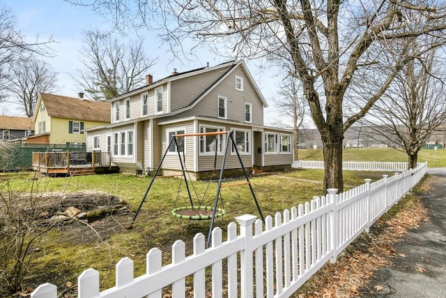 127 Carson Ave, Dalton, MA 01226 - view of front facade with a wooden deck and a chimney