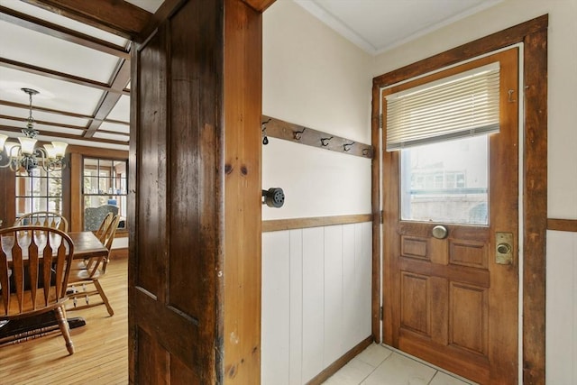 127 Carson Ave, Dalton, MA 01226 - entryway featuring plenty of natural light, a chandelier, and a wainscoted wall