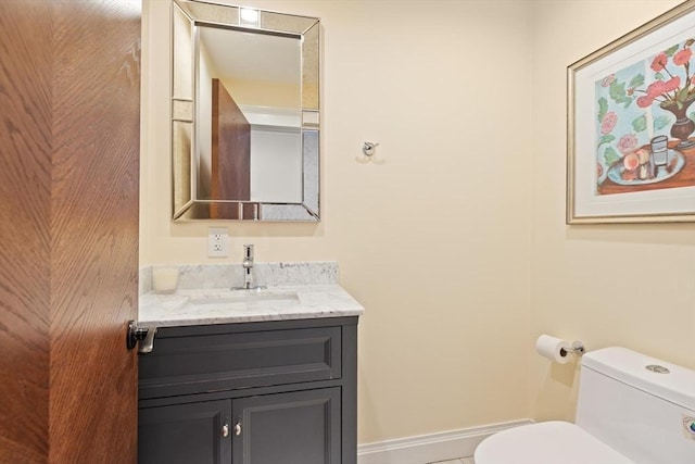 125 Heath St, Somerville, MA 02145 - half bathroom with vanity and tile patterned flooring