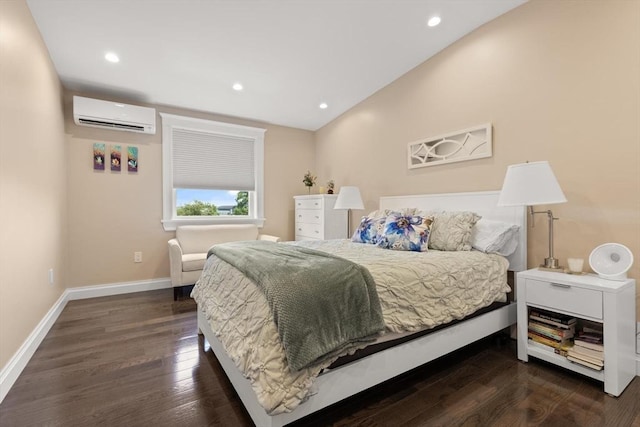 125 Heath St, Somerville, MA 02145 - bedroom featuring a wall mounted AC, dark wood-style floors, and recessed lighting