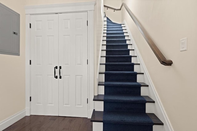 125 Heath St, Somerville, MA 02145 - stairway with electric panel and wood finished floors