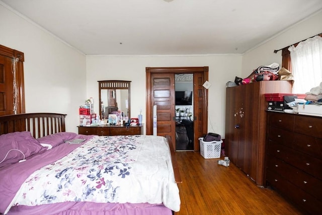 bedroom featuring dark hardwood / wood-style floors