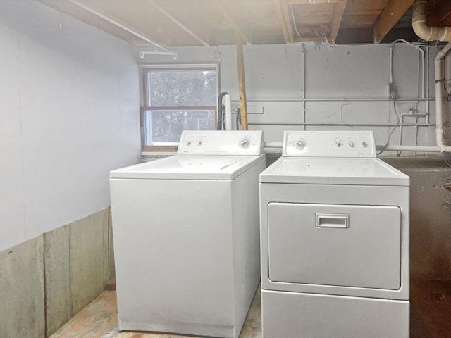 washroom featuring independent washer and dryer