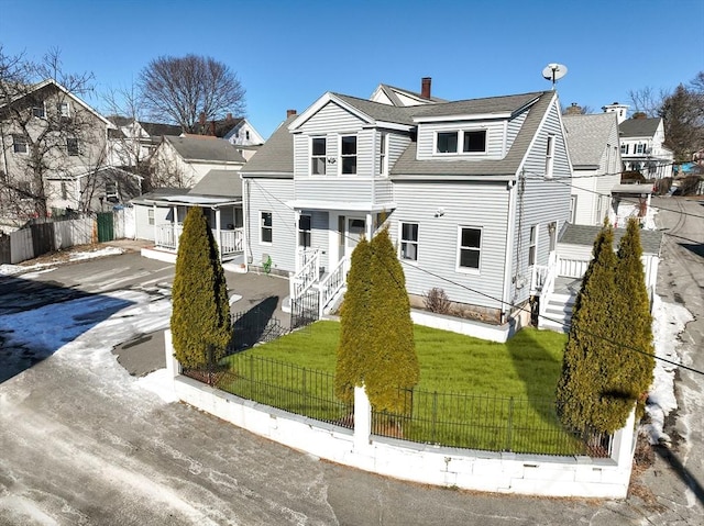 view of front facade with a front yard