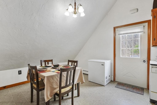 184 Burlingame Rd, Charlton, MA 01507 - dining room with lofted ceiling, a textured ceiling, a baseboard heating unit, baseboards, and a notable chandelier