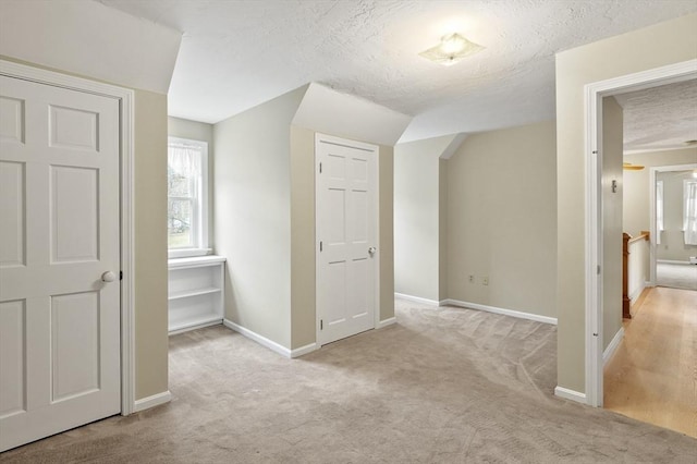 184 Burlingame Rd, Charlton, MA 01507 - bonus room with carpet, baseboards, and a textured ceiling