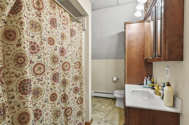 184 Burlingame Rd, Charlton, MA 01507 - bathroom with vanity, toilet, baseboards, baseboard heating, and a shower with shower curtain
