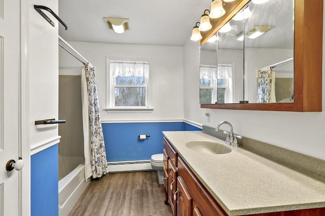 184 Burlingame Rd, Charlton, MA 01507 - full bath featuring vanity, toilet, baseboards, baseboard heating, and wood finished floors