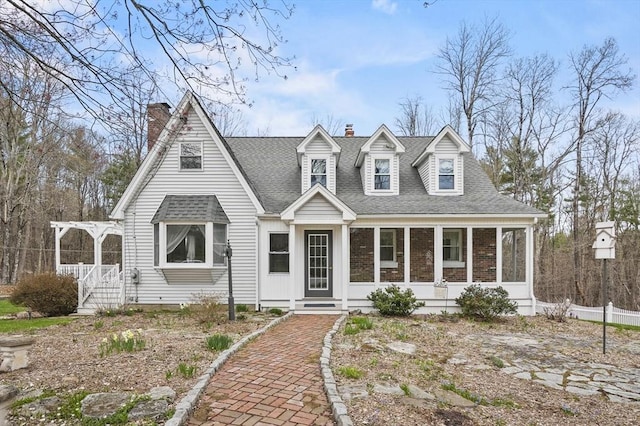 184 Burlingame Rd, Charlton, MA 01507 - cape cod-style house with a chimney, brick siding, fence, a sunroom, and roof with shingles