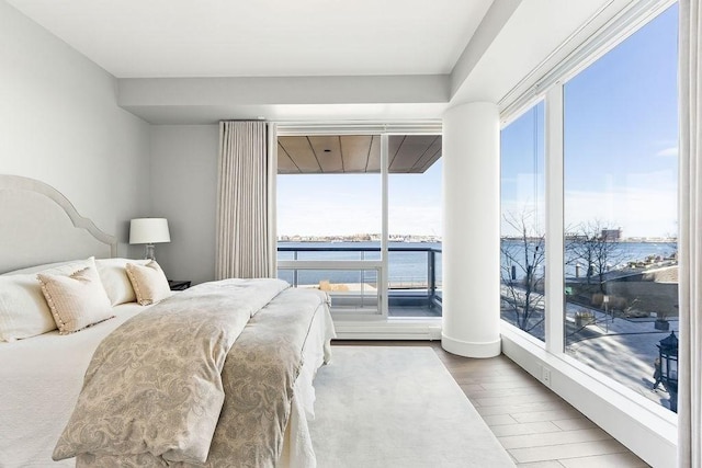 bedroom featuring wood finished floors