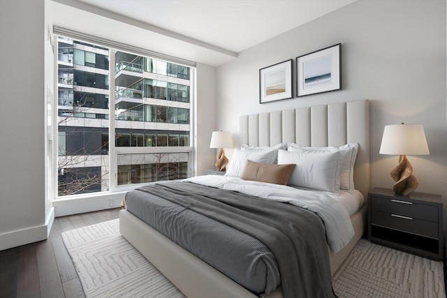 bedroom with wood finished floors