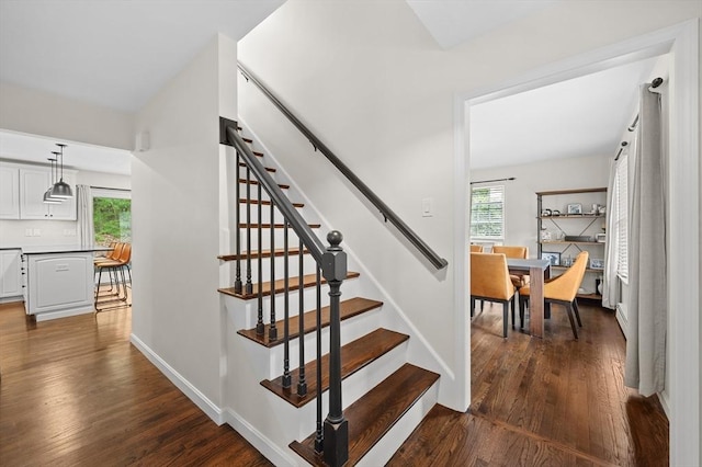 10 Old Broad St, Holden, MA 01522 - stairs featuring wood finished floors, plenty of natural light, and baseboards