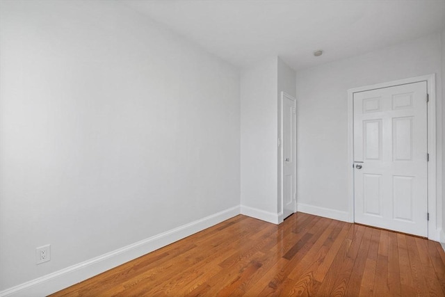 empty room featuring hardwood / wood-style floors