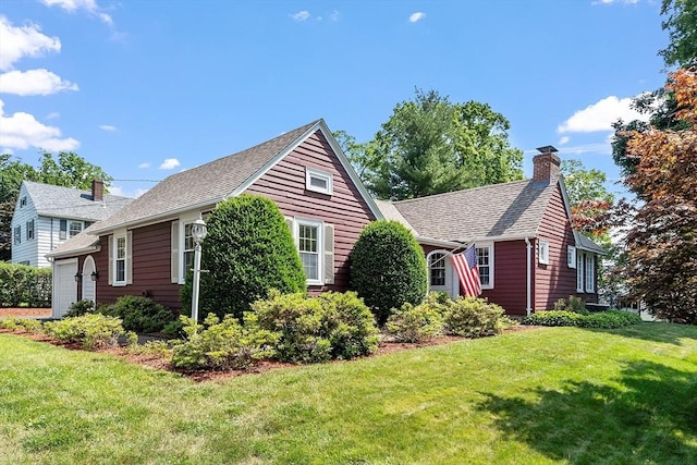 1 Beech Cir, Andover, MA 01810 - view of front of property with a chimney, a front lawn, an attached garage, and a shingled roof