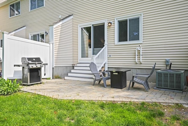 26 Gaslight Ln Unit 26, Easton, MA 02356 - back of house with entry steps, central AC unit, and a patio area