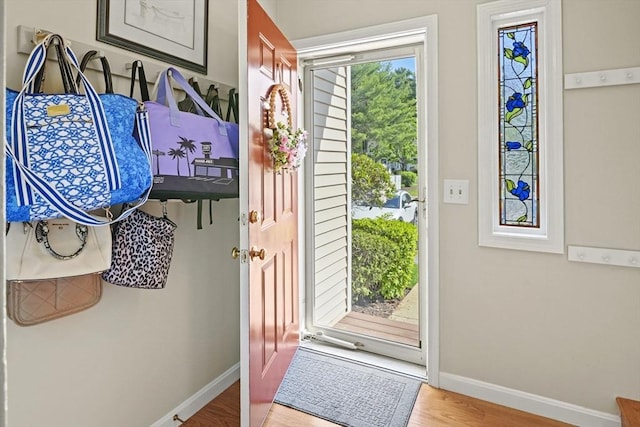 26 Gaslight Ln Unit 26, Easton, MA 02356 - doorway with baseboards and wood finished floors