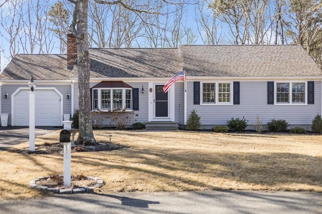 single story home featuring a front lawn, entry steps, a shingled roof, a garage, and a chimney