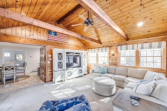 living area with carpet floors, vaulted ceiling with beams, wood walls, and a baseboard radiator