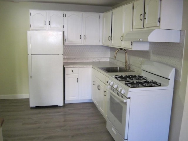 kitchen featuring white cabinetry, dark hardwood / wood-style flooring, sink, white appliances, and decorative backsplash