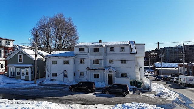 view of front of home with a chimney