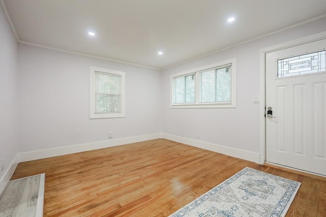 73 Laurie Ave, Abington, MA 02351 - entrance foyer with crown molding, baseboards, recessed lighting, and light wood-style floors