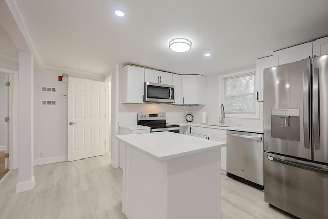 73 Laurie Ave, Abington, MA 02351 - kitchen with light wood-style floors, visible vents, light countertops, and appliances with stainless steel finishes