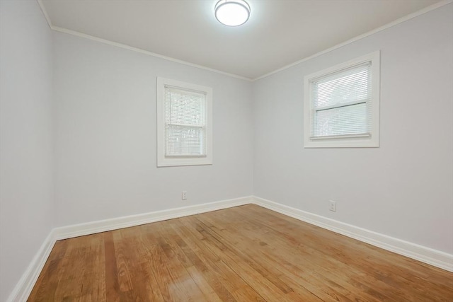 73 Laurie Ave, Abington, MA 02351 - empty room with light wood-style flooring, baseboards, and ornamental molding