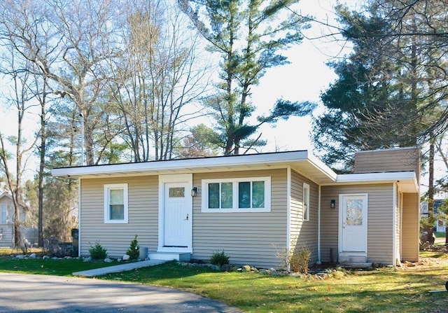 73 Laurie Ave, Abington, MA 02351 - view of front of house with entry steps and a front lawn