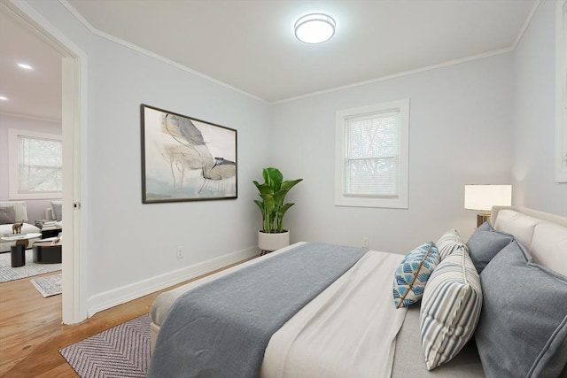 73 Laurie Ave, Abington, MA 02351 - bedroom with crown molding, wood finished floors, and baseboards