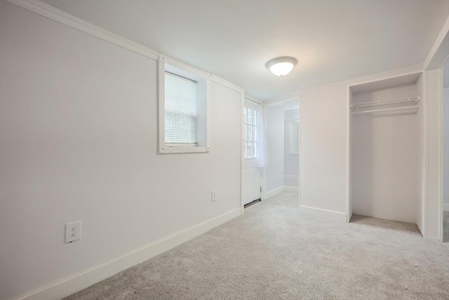 73 Laurie Ave, Abington, MA 02351 - unfurnished bedroom featuring a closet, baseboards, and carpet floors