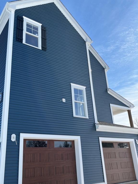 view of home's exterior featuring a garage