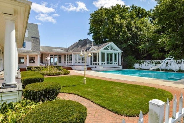 188 S St, Yarmouth, MA 02664 - pool featuring a lawn, a water slide, fence, and french doors