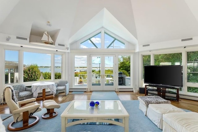 188 S St, Yarmouth, MA 02664 - sunroom featuring french doors, a baseboard radiator, and visible vents