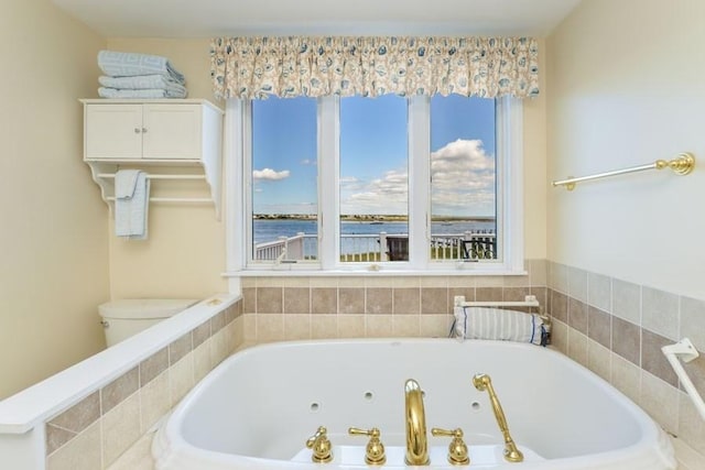 188 S St, Yarmouth, MA 02664 - bathroom featuring a tub with jets and toilet