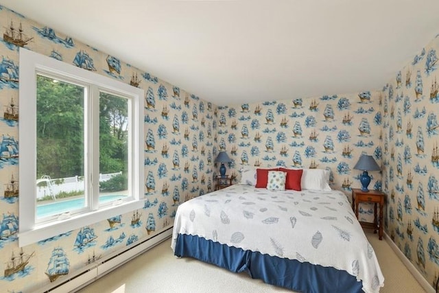 188 S St, Yarmouth, MA 02664 - carpeted bedroom with wallpapered walls and baseboard heating