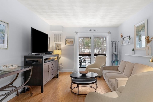 living room with light wood-type flooring