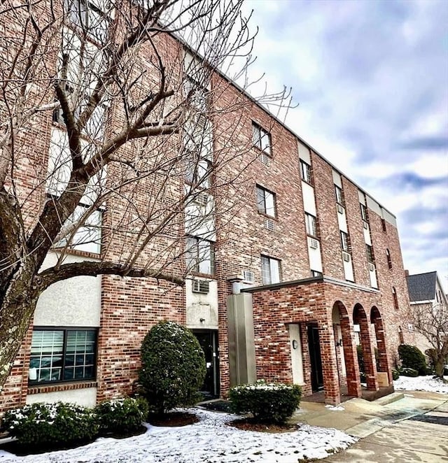 view of snow covered property