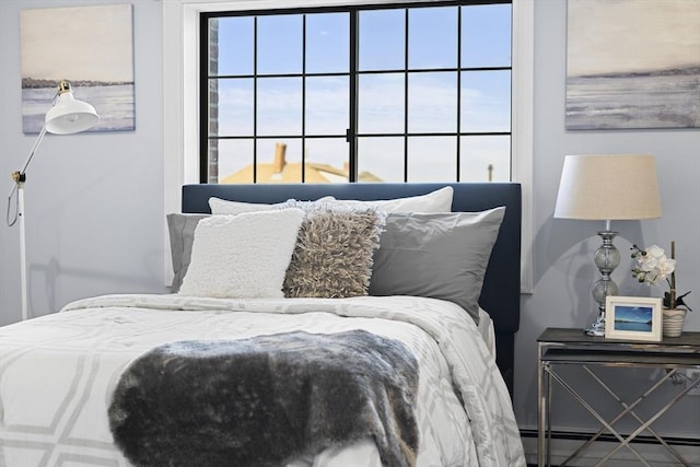 bedroom featuring a baseboard radiator