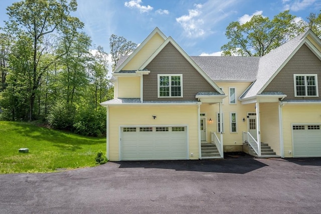 233A Green St Unit A, Boylston, MA 01505 - view of front of home featuring driveway, a garage, a front lawn, and roof with shingles
