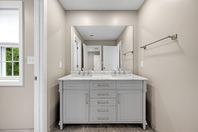 233A Green St Unit A, Boylston, MA 01505 - full bathroom featuring double vanity and baseboards