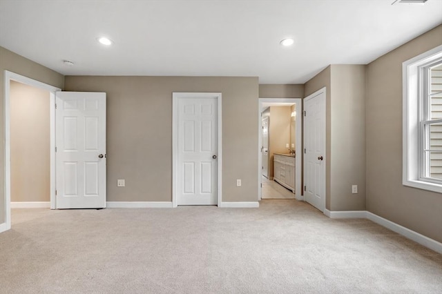 233A Green St Unit A, Boylston, MA 01505 - unfurnished bedroom featuring light colored carpet, baseboards, and recessed lighting