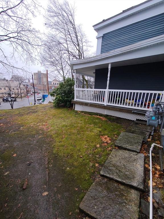 view of yard with a porch