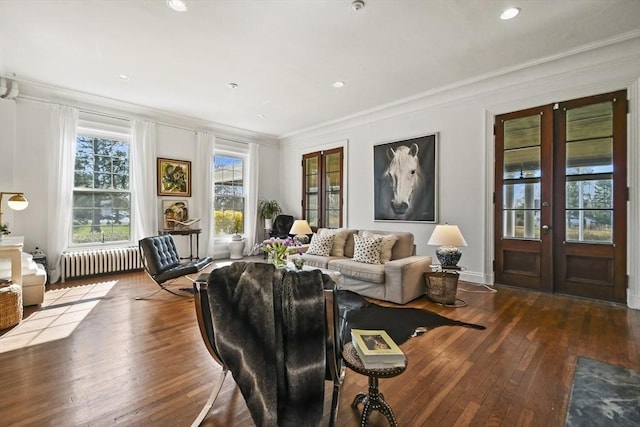 824 Tucker Rd, Dartmouth, MA 02747 - living area with radiator, healthy amount of natural light, hardwood / wood-style flooring, ornamental molding, and recessed lighting